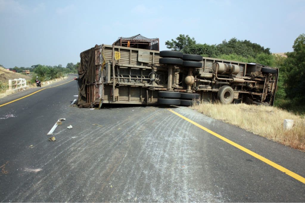 a truck that is sitting on the side of the road